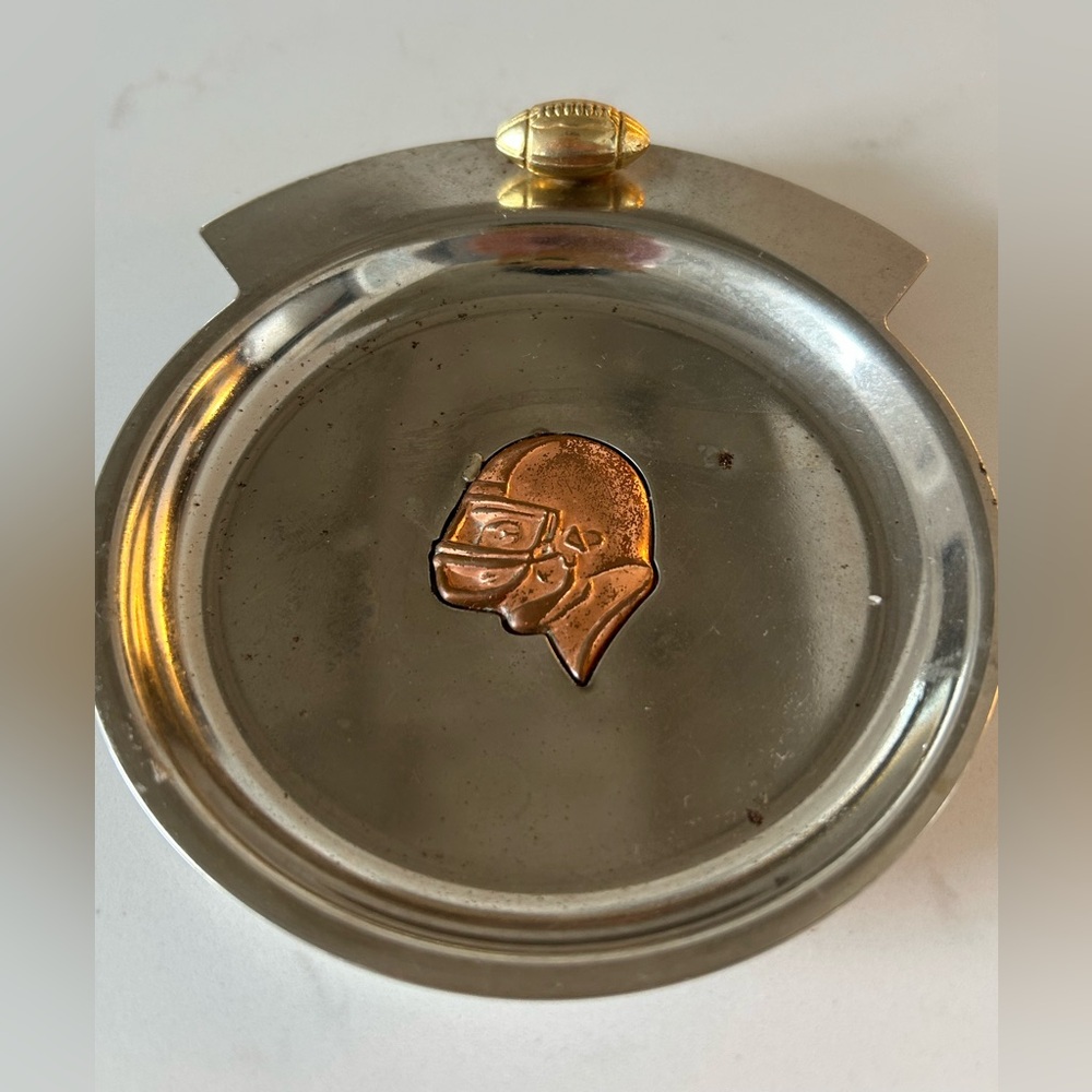 Vintage coin dish, football design in copper, brass and chrome.